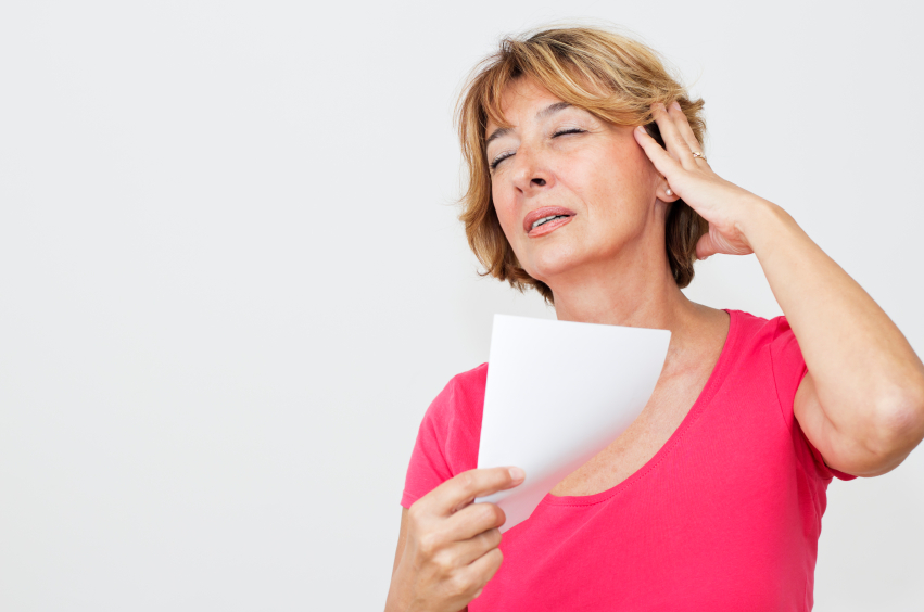 Woman in Menopause suffering hot flushes